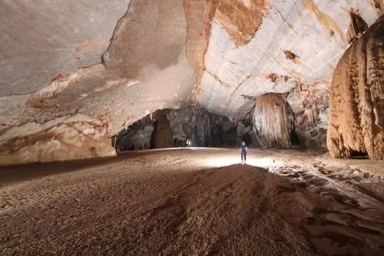 Camping inside Hang En, on the sand beach in the cave mouth.