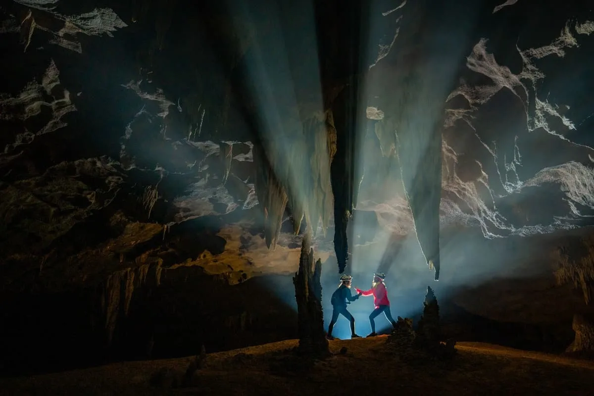 Shafts of light falling over the camp on the Hang Va expedition
