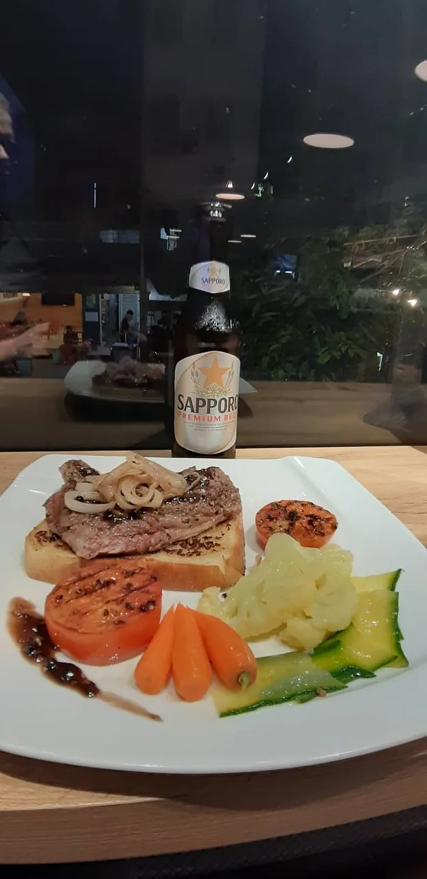 A meal and a cold beer in Ho Chi Minh City.